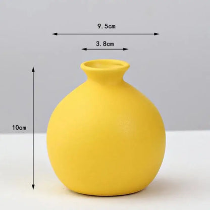 DecorBites™ yellow porcelain flower vase with rounded body and narrow neck for elegant home decor display