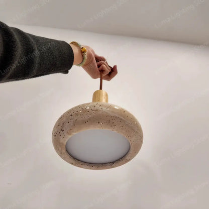 Beige speckled ceramic pendant light with wooden top and fabric cord stone pendant for kitchen island by decorbites