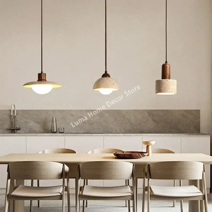 Decorbites yellow travertine pendant light with concrete stone pendant shades and copper accents for kitchen island lighting