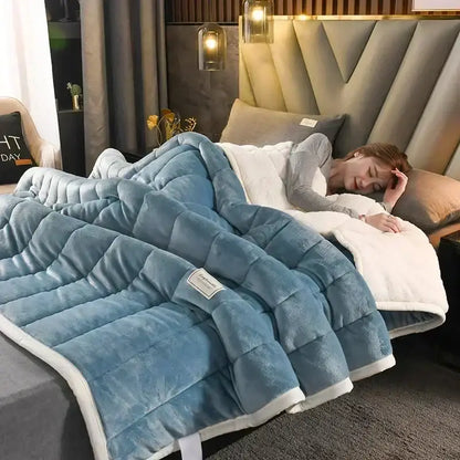 Deep blue and white cozy flannel fleece bedroom quilt with plush quilted texture and soft flannel fleece lambswool surface