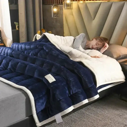 Deep blue and white cozy flannel fleece bedroom quilt with stitched diamond pattern and soft flannel fleece lambswool interior