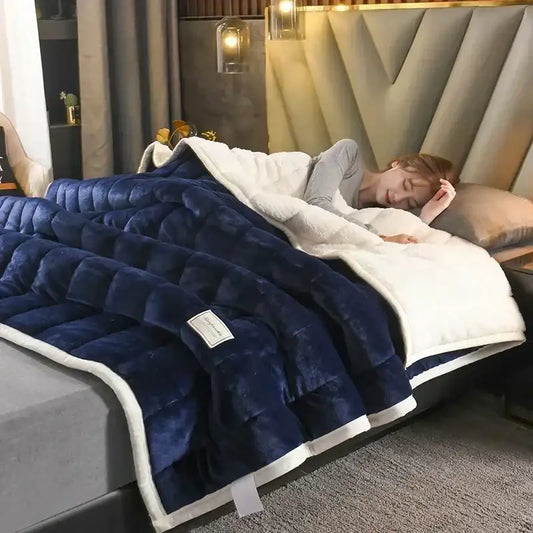 Deep blue and white cozy flannel fleece bedroom quilt with soft white fleece interior and stitched diamond pattern decorbites cozy flannel