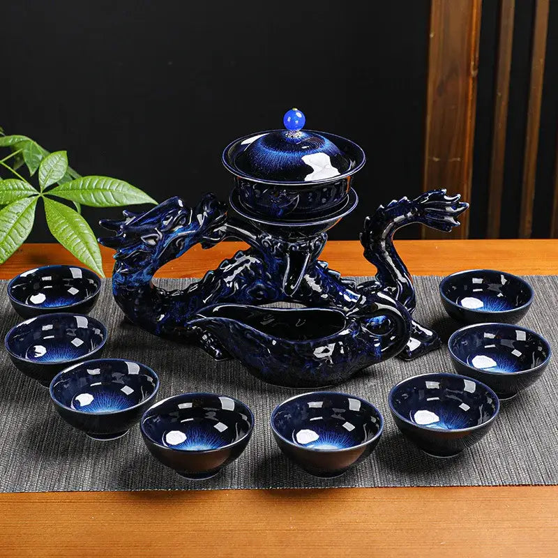 Deep cobalt blue ceramic kung fu tea set with glossy glaze featuring an intricately sculpted dragon design for decorbites dragon kung decor