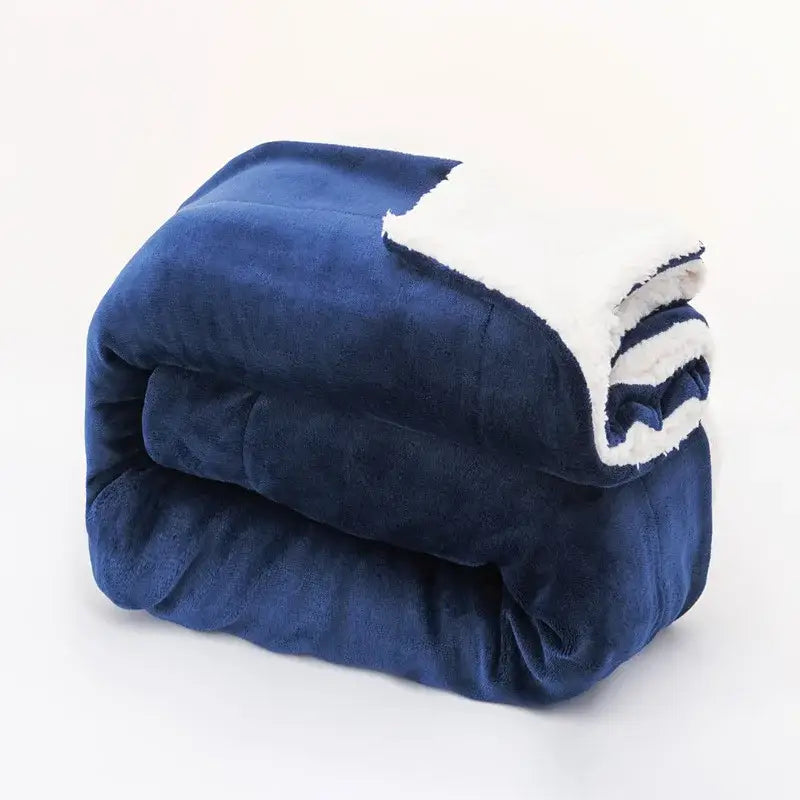 A plush deep blue and white double-layer lamb fleece blanket with soft sherpa lining for bedroom throw use