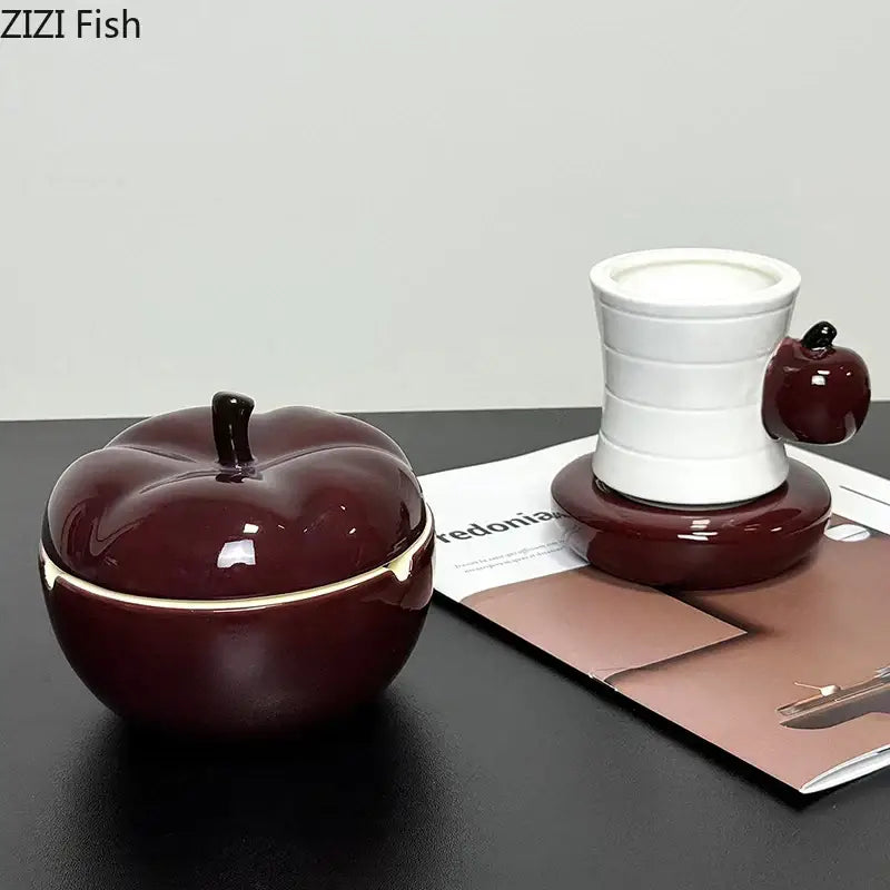 Deep red ceramic apple ashtray with matching lid featuring a glossy finish and subtle gold trim for living room decorbites decor