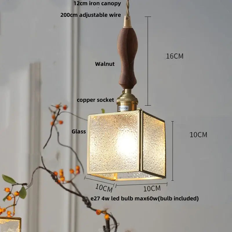 Square glass globe led pendant light with textured golden finish and dark walnut handle by decorbites pendant light