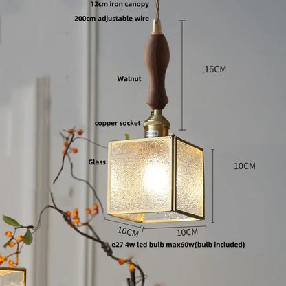 Square glass globe led pendant light with textured golden finish and dark walnut handle by decorbites pendant light