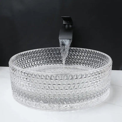 Diamond glass basin set featuring a clear geometric glass basin and black matte faucet for bathroom use