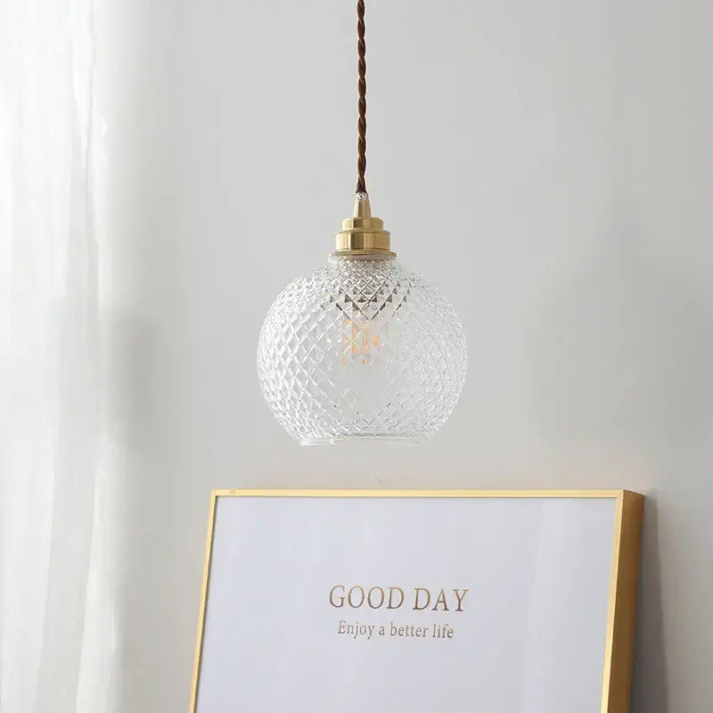 Clear glass pendant light with diamond-cut pattern and brass hardware decorbites glass ball led for dining room decor