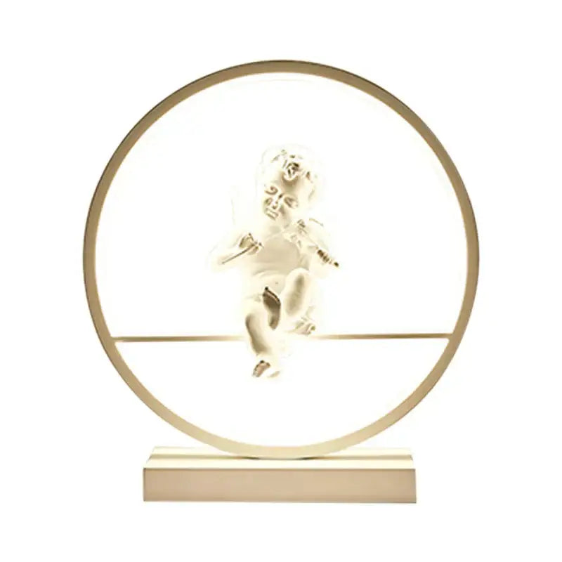 Dimbable angel table lamp featuring a translucent white cherub with outstretched wings in a softly lit circular frame