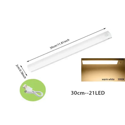 A sleek 30cm white decorbites dimmable led strip light with warm white illumination for kitchen use