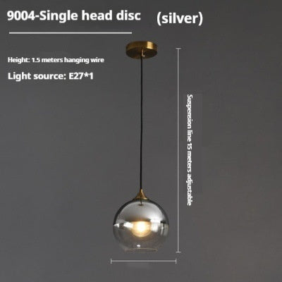 Silver globe pendant light with gold accents and adjustable suspension wire for dining room chandelier 3-head disc design