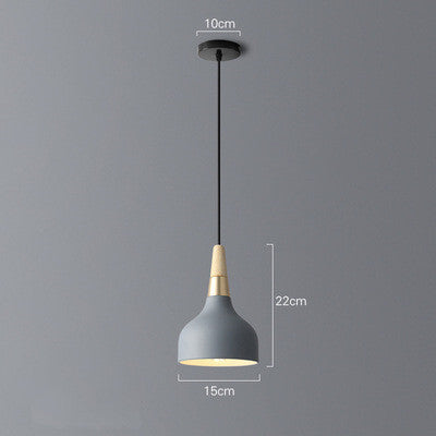 Gray dining room chandelier with wooden accents and black cord modern design three small pendant lights
