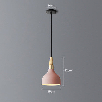 Pink dining room chandelier pendant light with gold accents black cord and metal base for corridor use