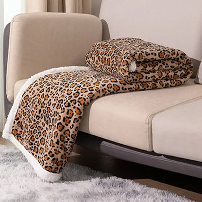 Cozy double layer leopard print coral fleece blanket with beige base orange brown spots and white fleece lining