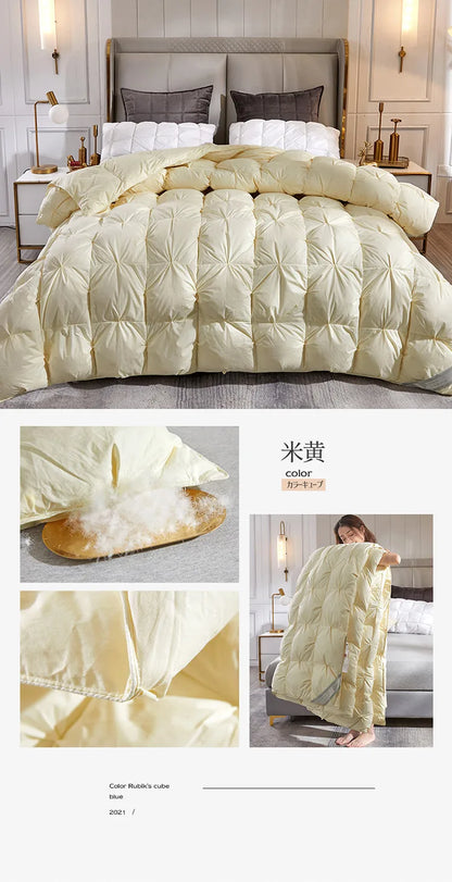 A cream-colored down duvet with soft diamond stitching filled with 95 white goose down for five-star warmth