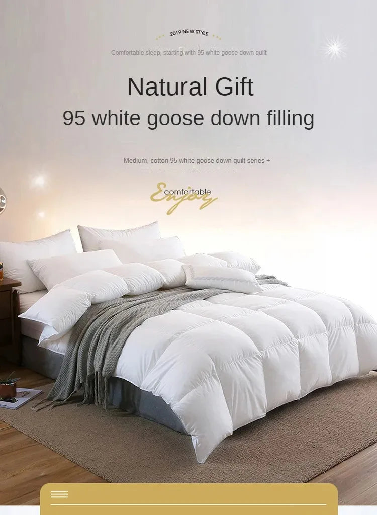 White 95% goose down duvet with cotton casing featuring plush texture for warm cozy comfort in five-star hotels