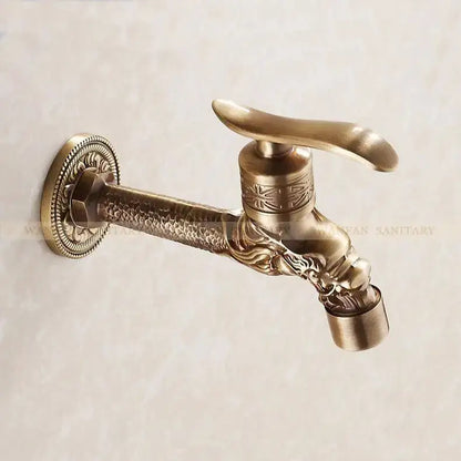 Antique bronze dragon carved faucet with ornate dragon head and intricate embossed patterns for bathroom or outdoor use