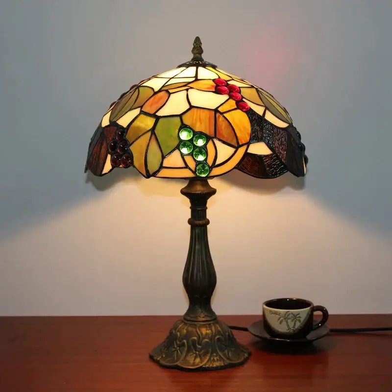 Vintage-style decorbites dragonfly tiffany stained glass table lamp with grape leaf motif amber green cream panels and brass base