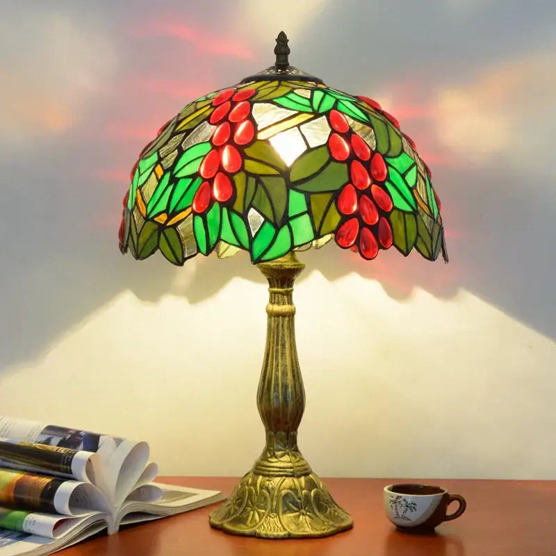 Vibrant decorbites dragonfly tiffany stained glass table lamp with red coffee beans, green leaves, and ornate brass base