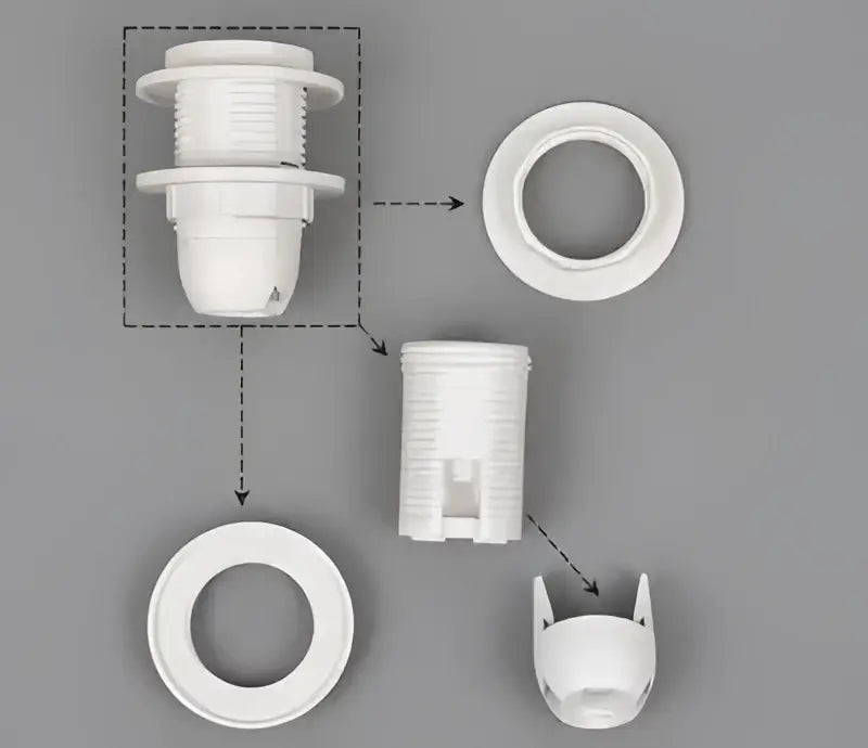 White plastic e27 lamp bulb holder fitting with threaded base and decorative cat-shaped end cap for living room use