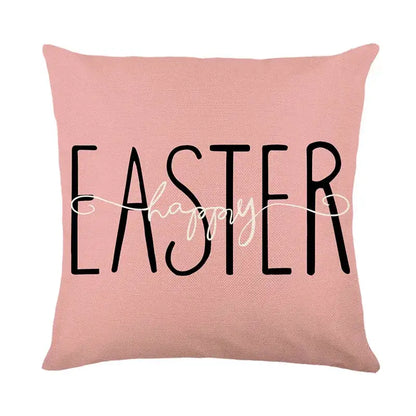 Pink linen cushion cover with easter bunny rabbit design featuring bold black easter text and white happy script