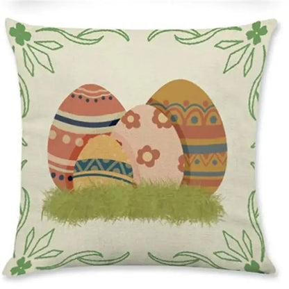 Easter rabbit eggs linen pillowcase set featuring three patterned peach orange and cream eggs on beige with green floral border