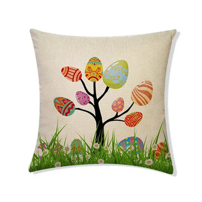 Beige linen eggs linen pillowcase featuring a black tree with colorful easter rabbit eggs and grassy field design