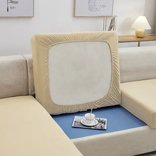 Beige stretchy fabric sofa back cover with elasticized edges and central open panel for gray stretch sofa seat cushion protector