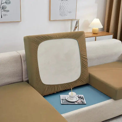 Tan elastic fabric sofa cushion cover with white central panel and ruched edges for living room protector