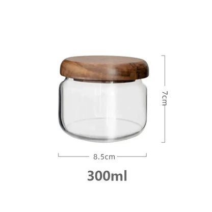 Clear glass food storage jar with 300ml capacity and elegant acacia wood lid for kitchen use