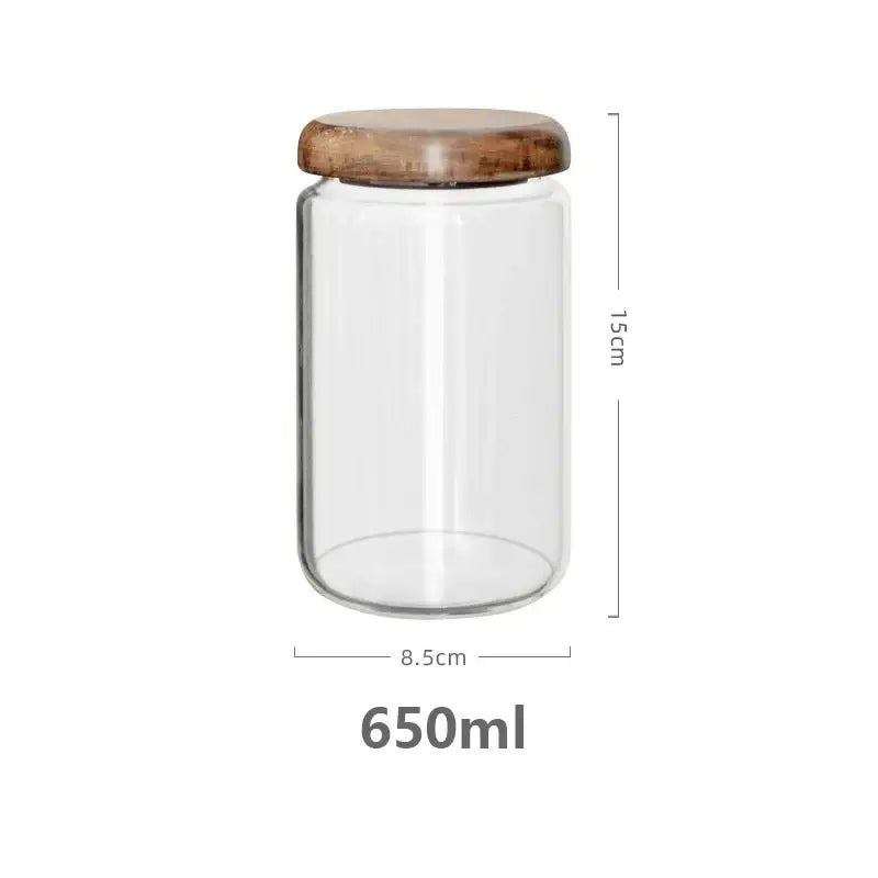 Clear glass food storage jar with elegant acacia wood lid and 650ml capacity for kitchen use