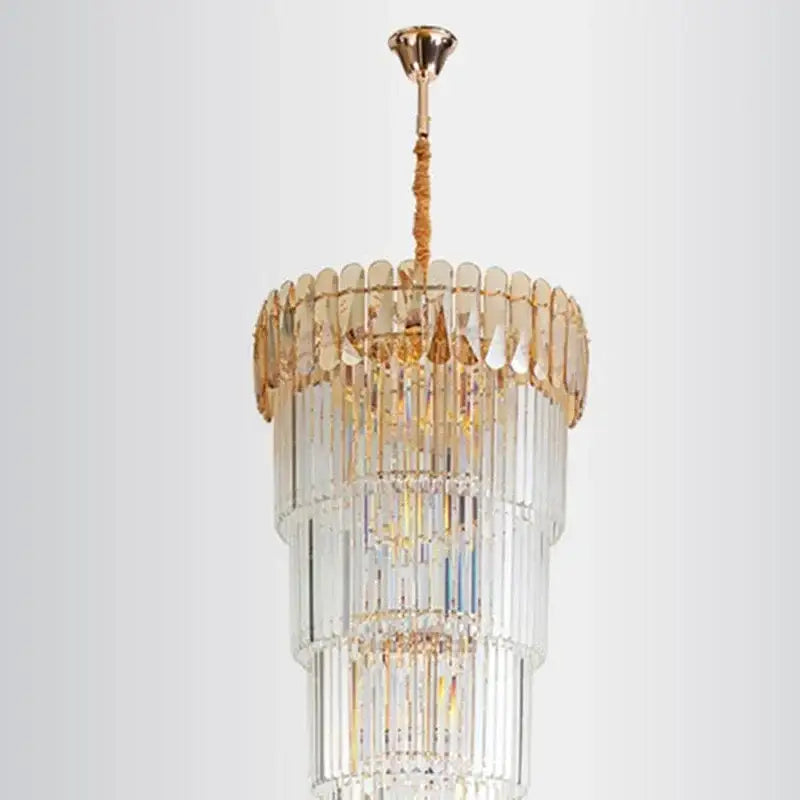 Elegant amber and clear tiered crystal led pendant chandelier with gold-toned metal accents for dining room decorbites crystal led