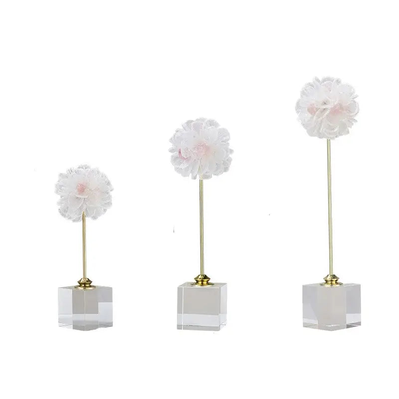 Elegant amethyst crystal flower glass sculptures featuring three white fabric crystal flowers with pink centers on gold stems decorbites crystal flower decor