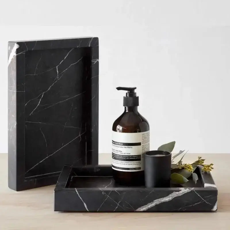 Elegant black and white afralia marble tray featuring white veining for bedroom decor as a stylish marble tray