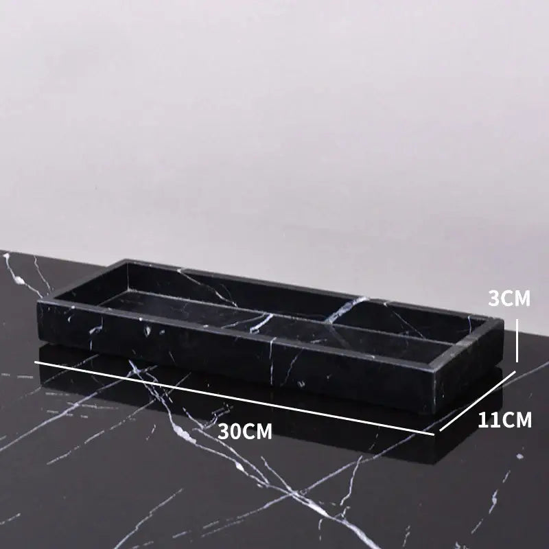 Elegant black and white afralia marble tray with white veining divided into three compartments for bedroom decor