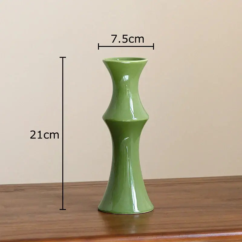 A sleek sage green bamboo shape ceramic vase with slender fluted design for decorbites bamboo shape living room decor