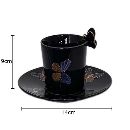 Elegant black ceramic tea cup and saucer set featuring a butterfly design and decorative butterfly handle for dining room use