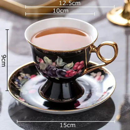 Elegant black porcelain teacup with gold trim and hand-painted berry fruits pattern ceramic from decorbites fruits pattern set