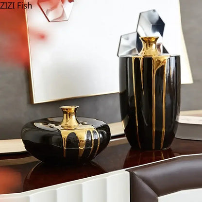 Elegant black gold ceramic vases with gold metallic drips and reflective surfaces for luxury living room decor
