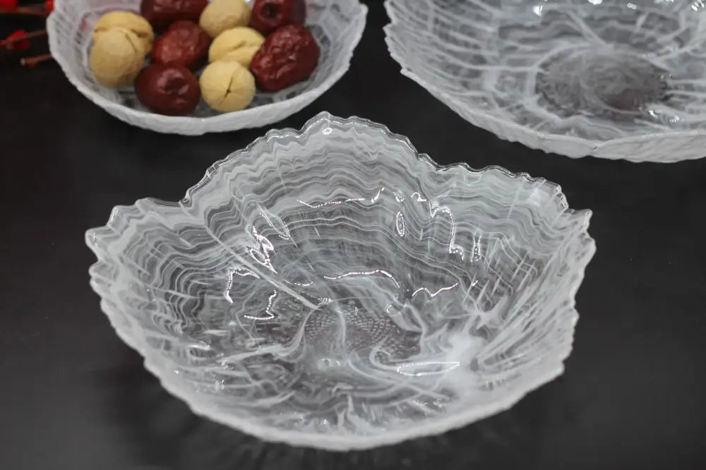 Clear leaf-shaped glass bowl with intricate swirling patterns and frosted finish for decorbites elegant flower glass plate