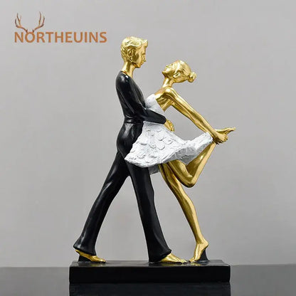 Golden and black resin dance girl double statue featuring a ballet dance girl in white tutu for living room decor