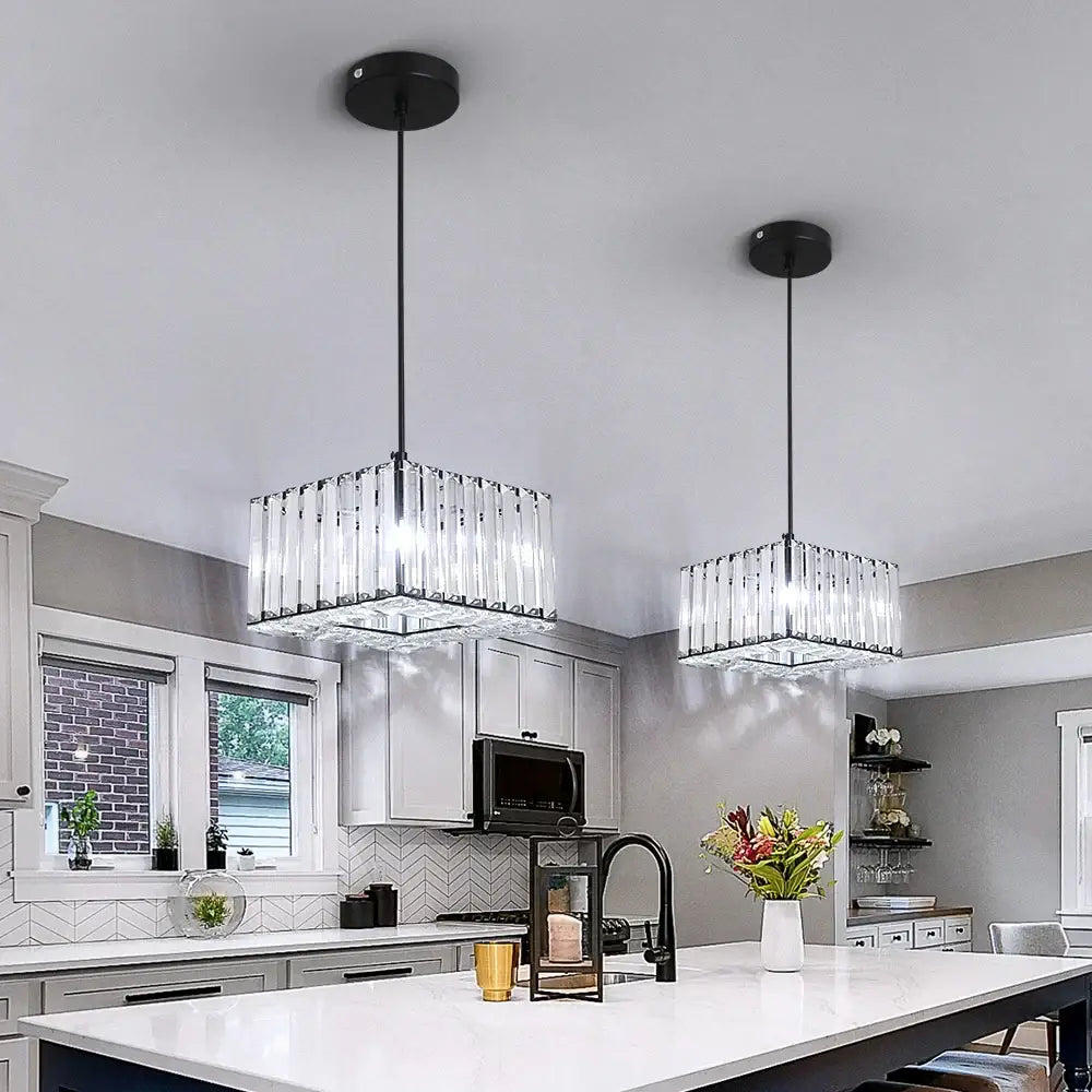 Elegant brass and crystal led pendant light with modern black and clear crystal glass panels for kitchen island decorbites crystal led pendant
