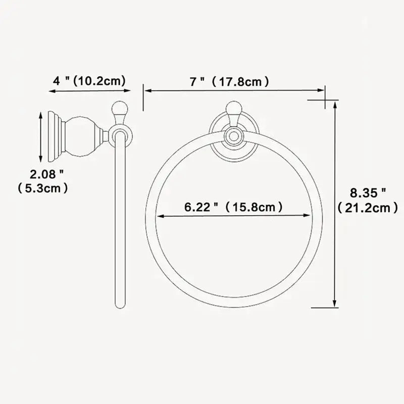 Brass-finished towel holder with a classic ornate design and circular loop for bathroom decorbites crystal towel holder