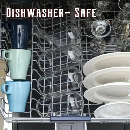 Open dishwasher rack holding elegant clear glass bubble tea cup set with bamboo lid alongside colorful decorbites glass bubble mugs