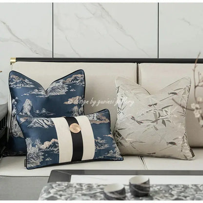 Elegant blue cushion with silver beige mountain embroidery and black white striped band featuring gold decorbites dragonfly insects embellishment