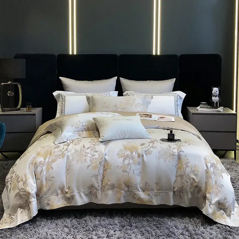 Cream-colored satin duvet cover with gold floral embroidery and matching pillowcases in decorbites 1200tc egyptian cotton bedding set