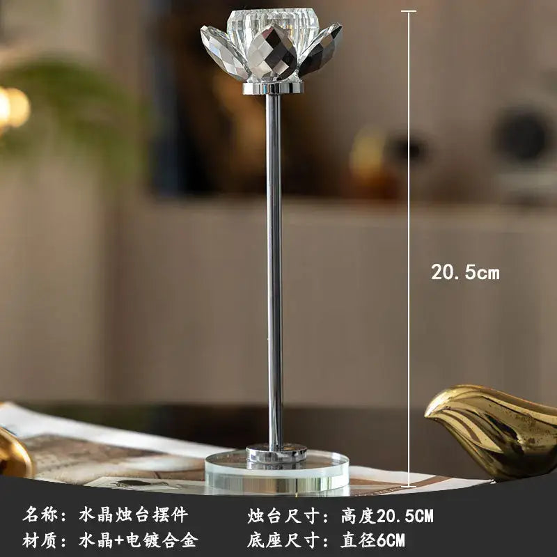 Elegant crystal and gold candle holder set featuring a clear crystal lotus candle holder with chrome base for dining decor