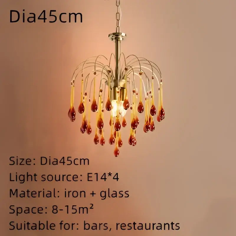 Brass-toned crystal ceiling chandelier with dangling amber glass teardrop pendants for elegant dining room decorbites elegant crystal