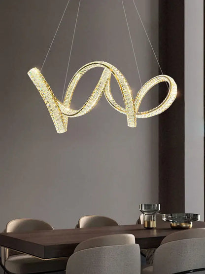 Gold-toned crystal-encrusted modern chandelier with sleek intertwined loop design by decorbites elegant crystal for living room decor